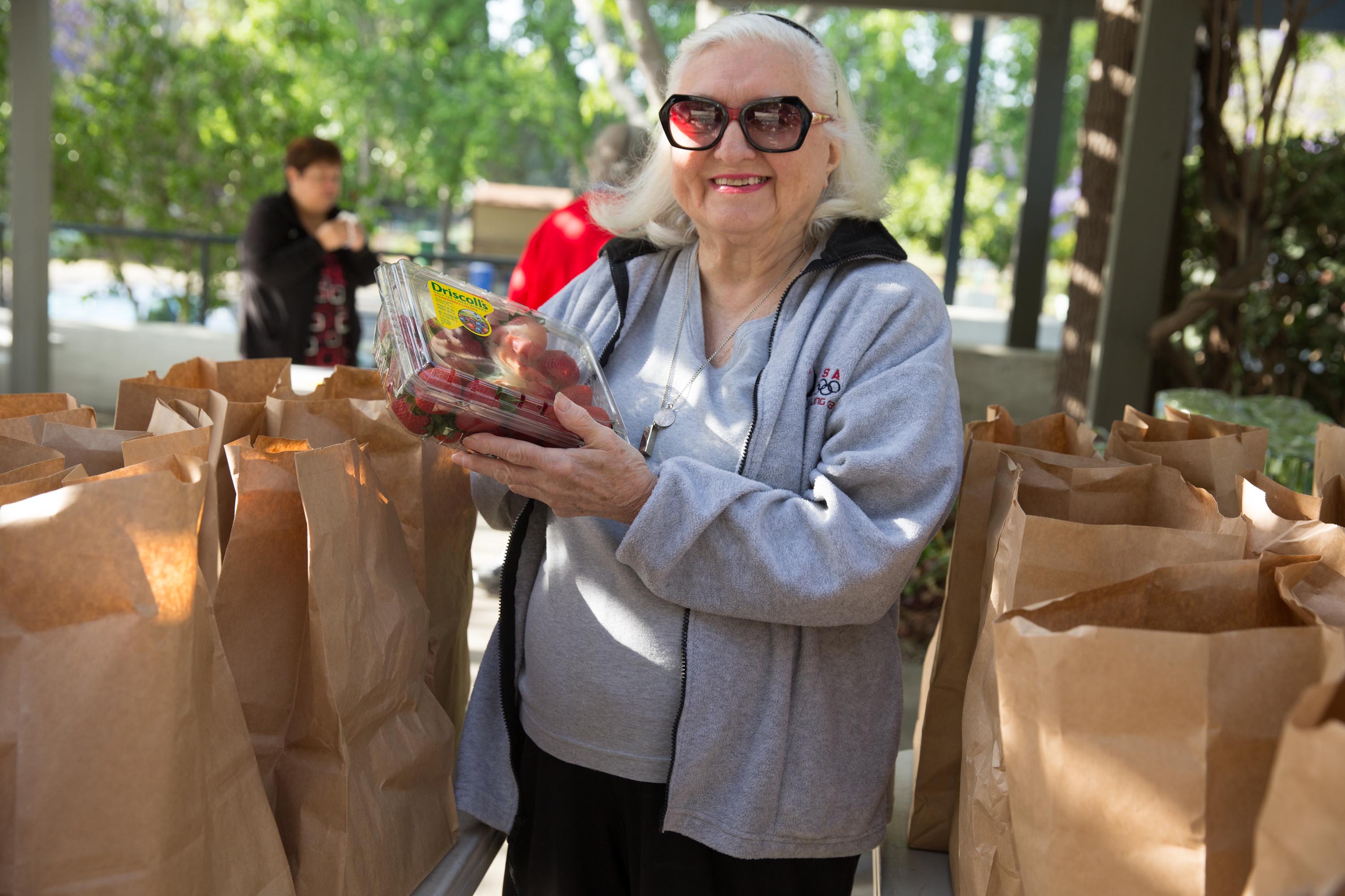 Senior with fresh produce